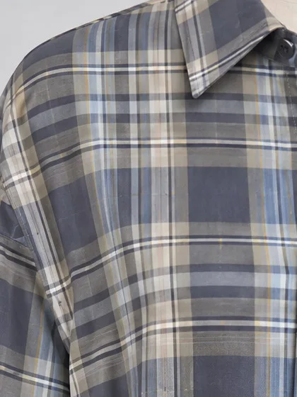 Close crop of the collar and placket, every check line and the fine overcheck stripes clearly resolved