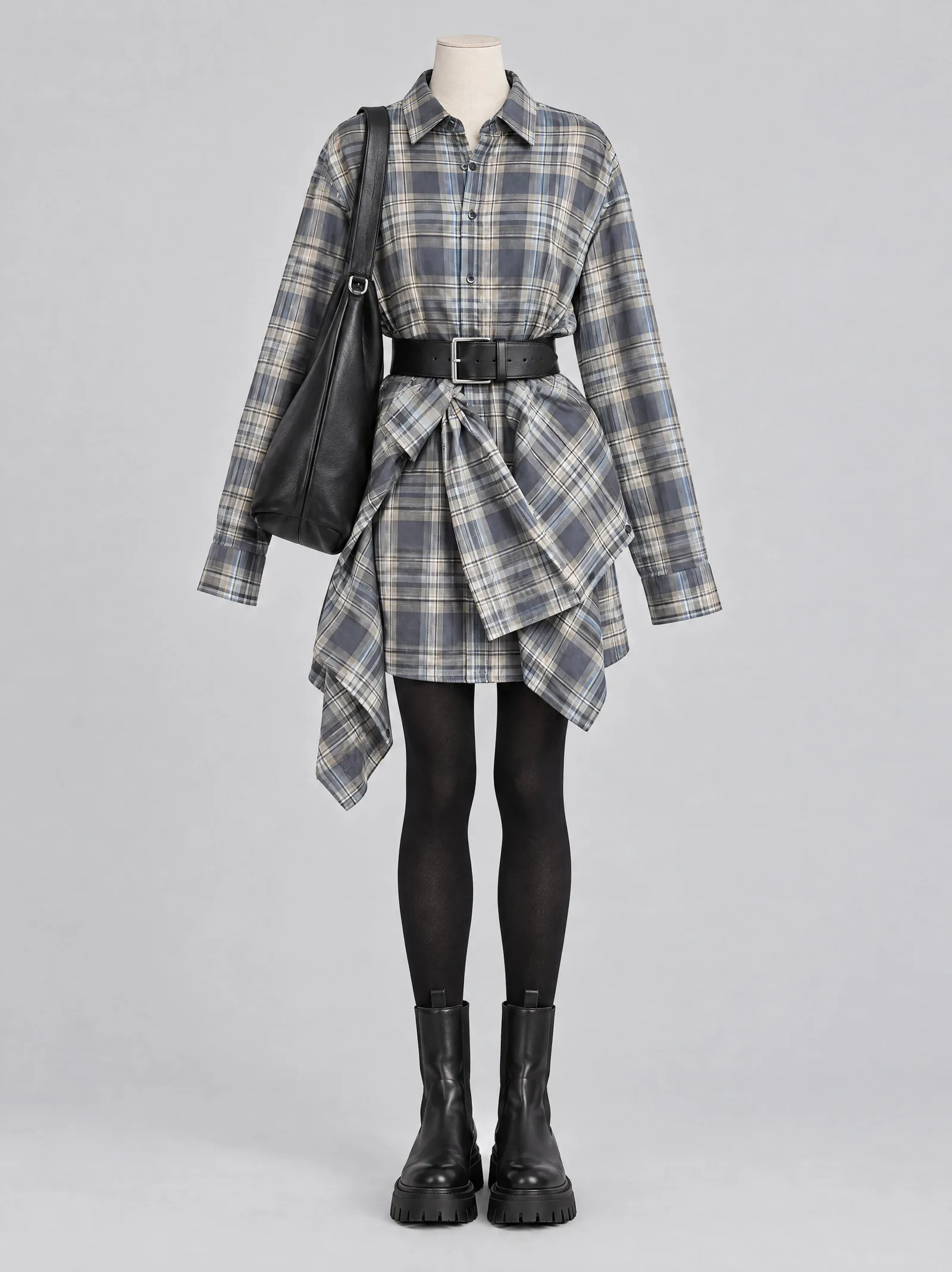 A full outfit on a mannequin, the shirt dress with tights, boots, a wide belt and a shoulder bag, all at equal size in one frame